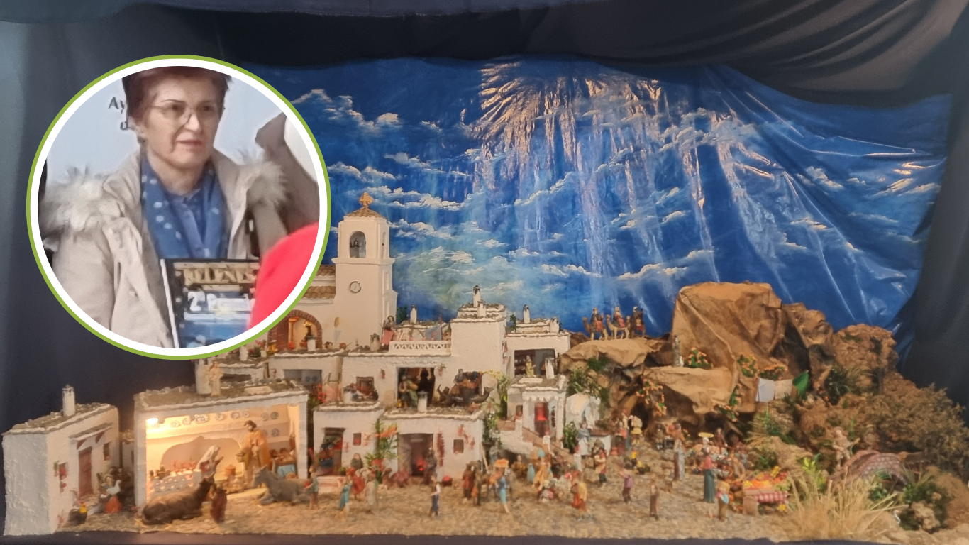 Vista general del belén de María Dolores, segundo premio del II Concurso Municipal de Belenes de Peligros, con la autora destacada en un recuadro circular.